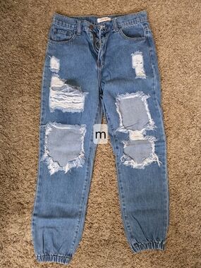Vibrant Ripped Light Blue Denim Joggers